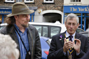 Frazer Johnston, the designer and builder of the ziggurat, with Peter Chandler from the Rotary Club of Stokesley."