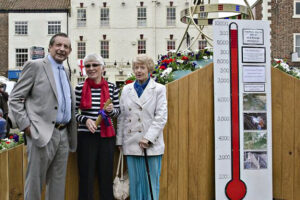 Linda (centre) with George and Jan Carter at the official opening of the new ziggurat."