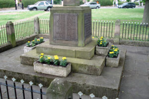 A closer view of the war memorial after cleaning and tidying."