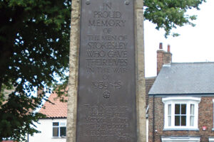 A plaque on the war memorial."