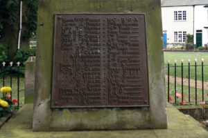 A plaque on the war memorial."