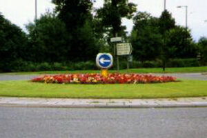 In addition to tubs and baskets we also plant the beds on local roundabouts.