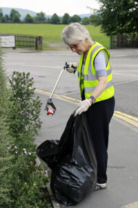 Litter picking at the entrance to the Showfield.