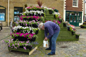 Assembly of the original Ziggurat in Market Square."