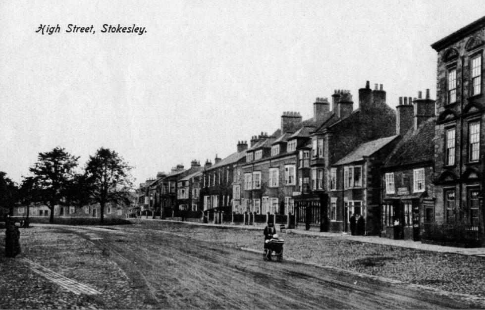 Looks like a Postcard. The West End of Stokesley, showing what is now the Delicatessen, Stokesley House, and West Green